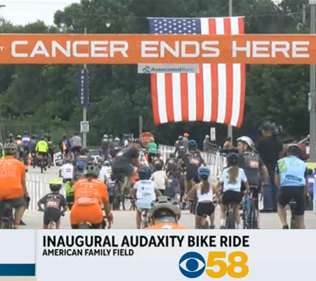 Kids and families ride bikes at American Family Field at the Audaxity Ride